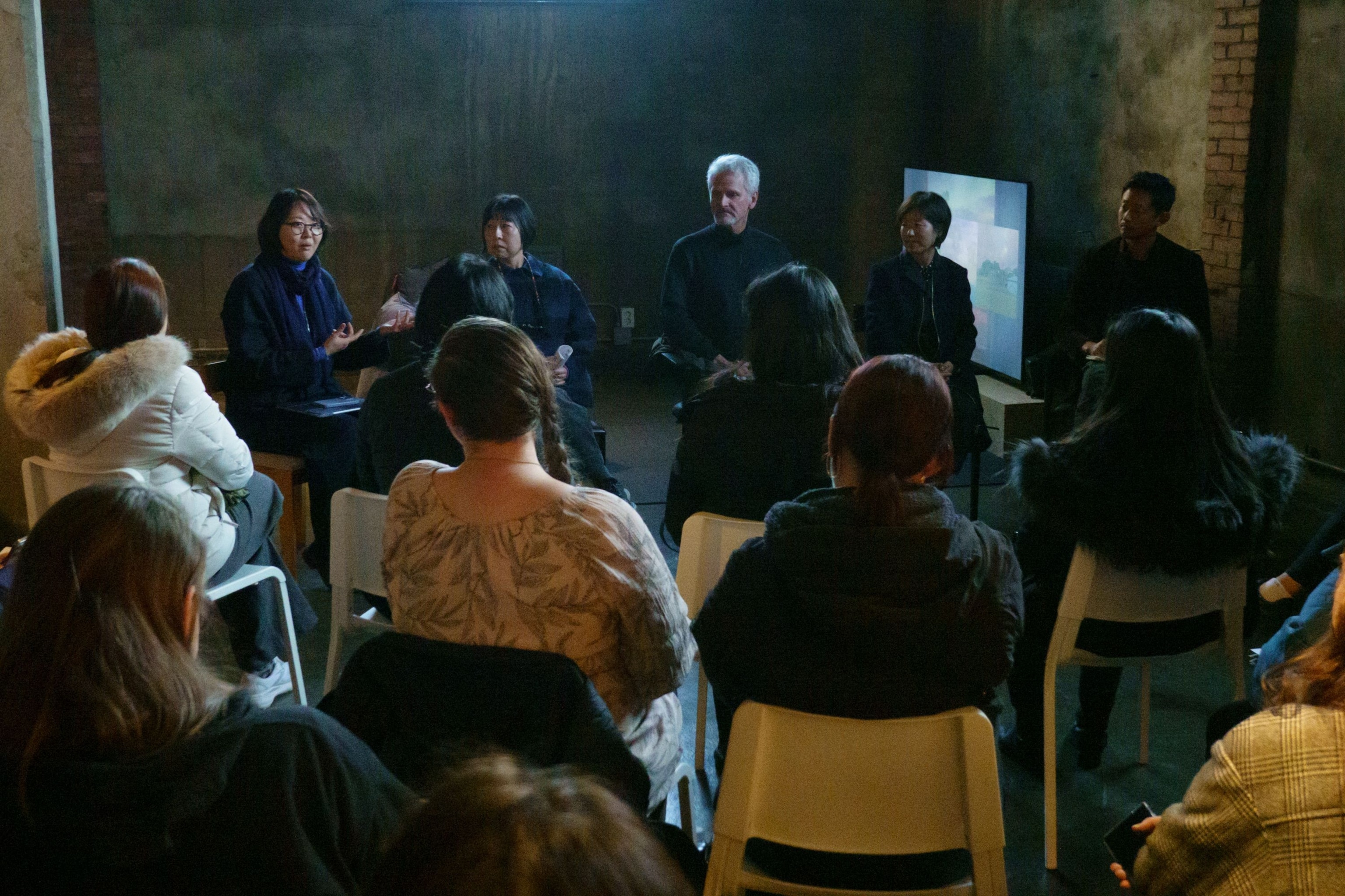 Curator Sooyoung Leam, Paul Salopek and exhibition artists gave a talk at the opening of the "Walking Korea" exhibition in Seoul, South Korea, in 2024. The exhibition, intended to expand the project’s journalism focus to include the arts of the countries Salopek walked through, was nearly shut down when martial law was declared in the country. “As it turned out, South Korea’s political crisis made the exhibition all the more purposeful and urgent,” Salopek wrote.