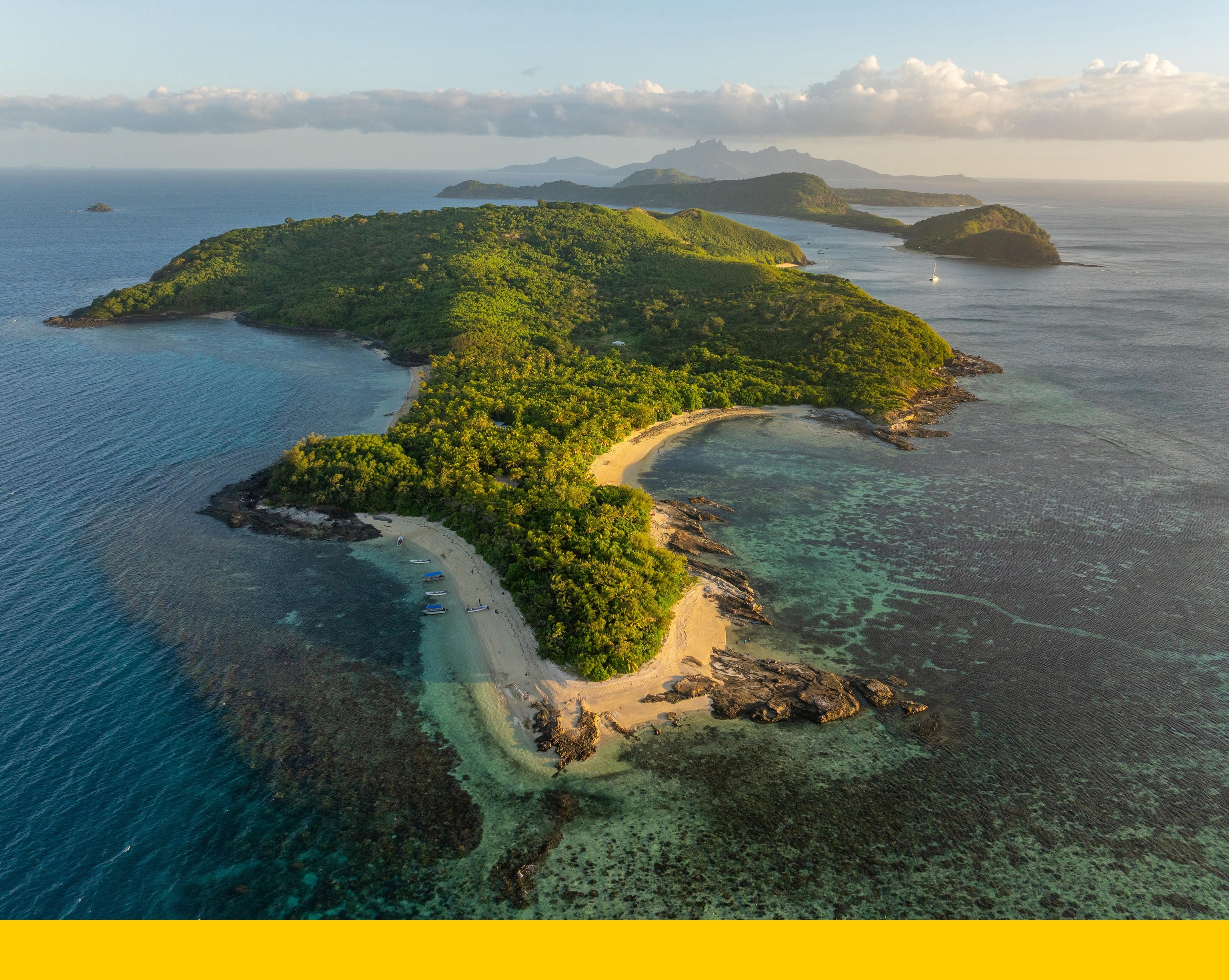 Sunset looking back at Barefoot Manta Island Resort, located on Drawaqa Island in the Yasawa Islands of Fiji.