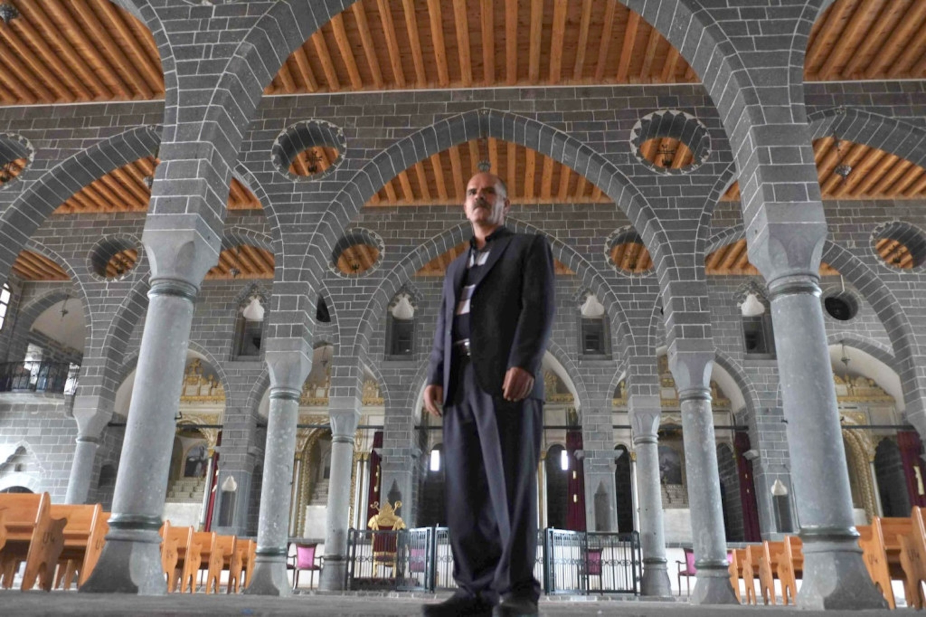 From Ani, Salopek chronicled life in “the ruin of a vanished world in modern Turkey.” Pictured: Aram Khatchigian in the rebuilt Sourp Giragos Armenian church in Diyarbakir, the Kurdish cultural capital in Turkey.