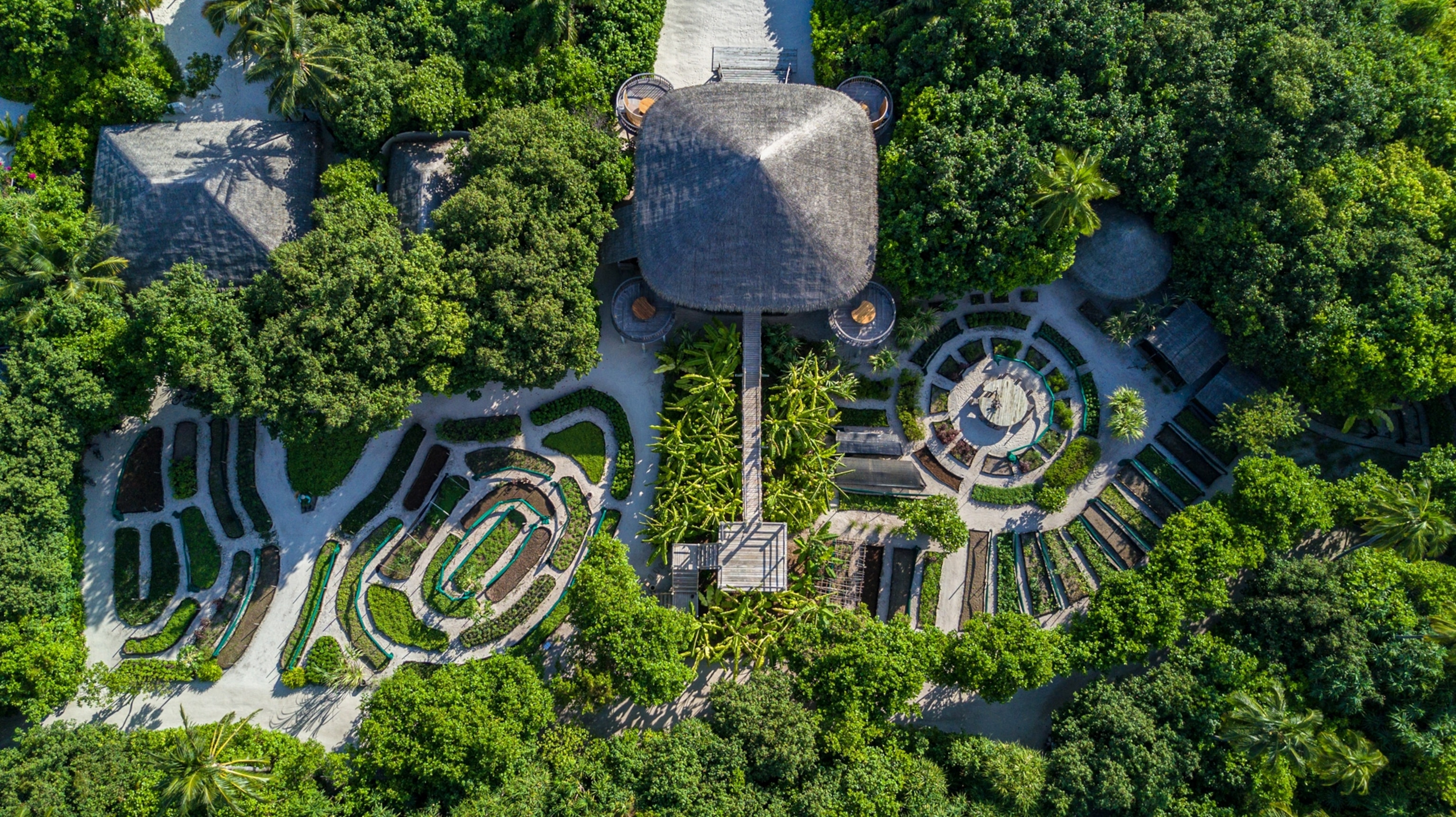 An aeral if the LEAF restaurant with Organic Garden at Six Sense Laamu