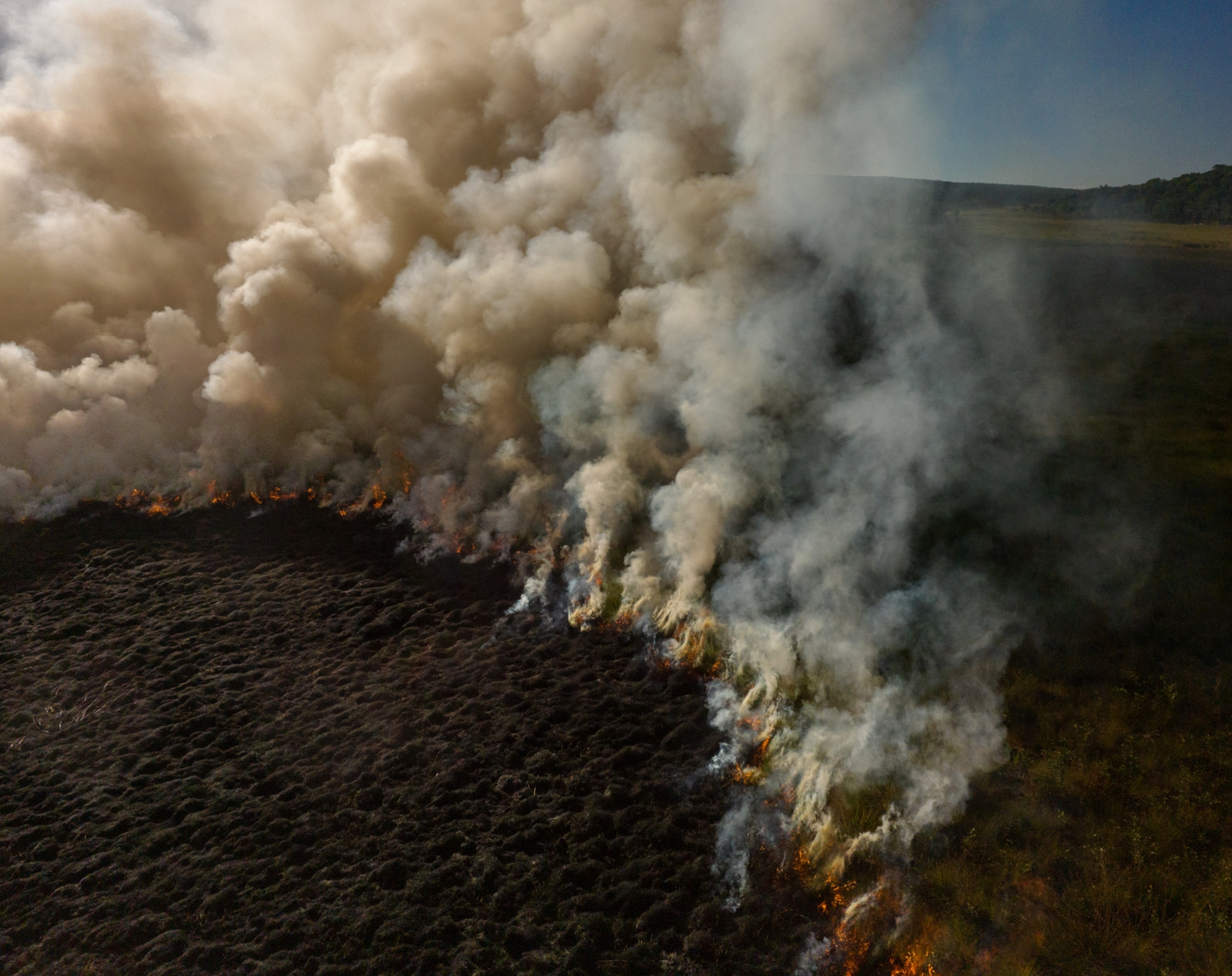 Aerial view of burning peatland.